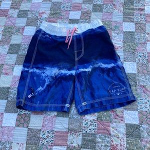 Gap surf swim trunks. Kid’s medium hardly ever worn